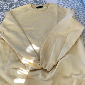 Yellow sweatshirt